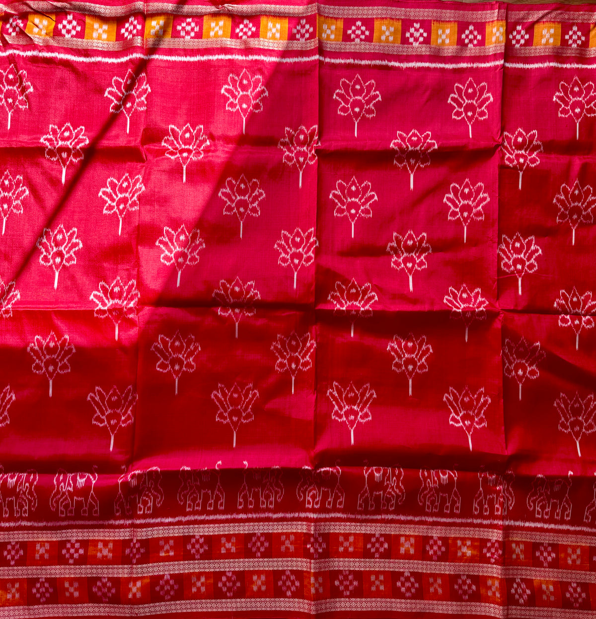 Red color Elegant khandua ikat pure silk saree with Elephant lotus motifs in body and pasapalli border |Odisha Weaves