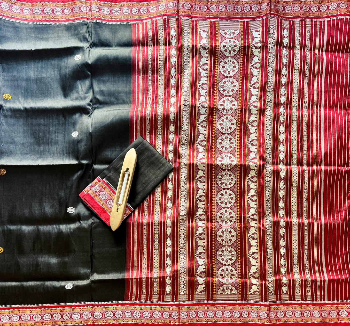 Black with red combinations contemporary ikat from Odisha weaves with konark chakra jala weaving