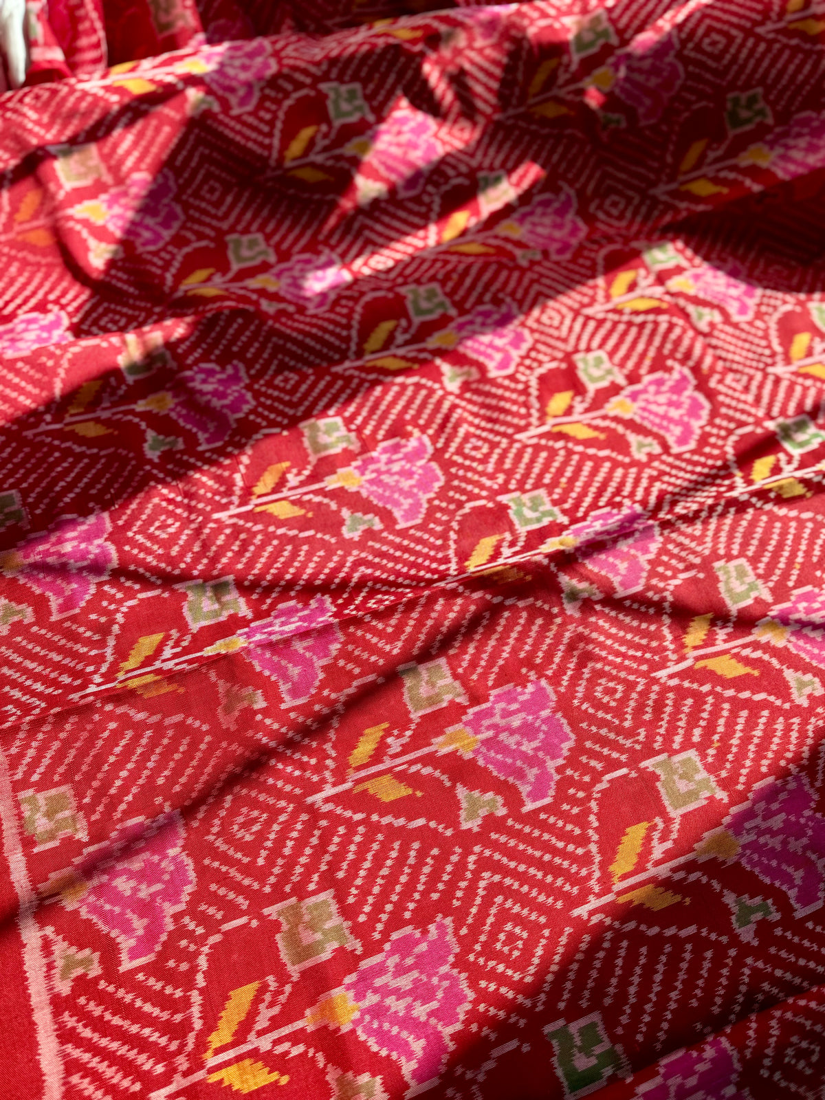 Red color single ikat patan Patola pure silk saree (aka semi-double ikat)