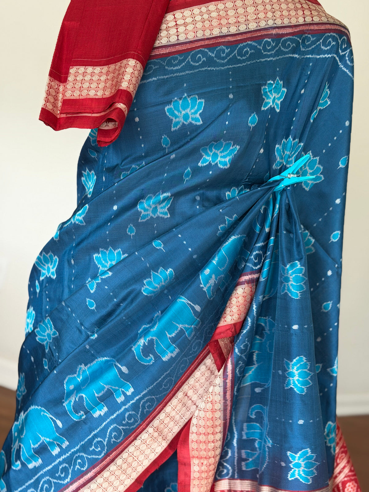 Teal blue and maroon handwoven Sambalpuri thousand motif pure Ikkat silk saree | Odisha Weaves
