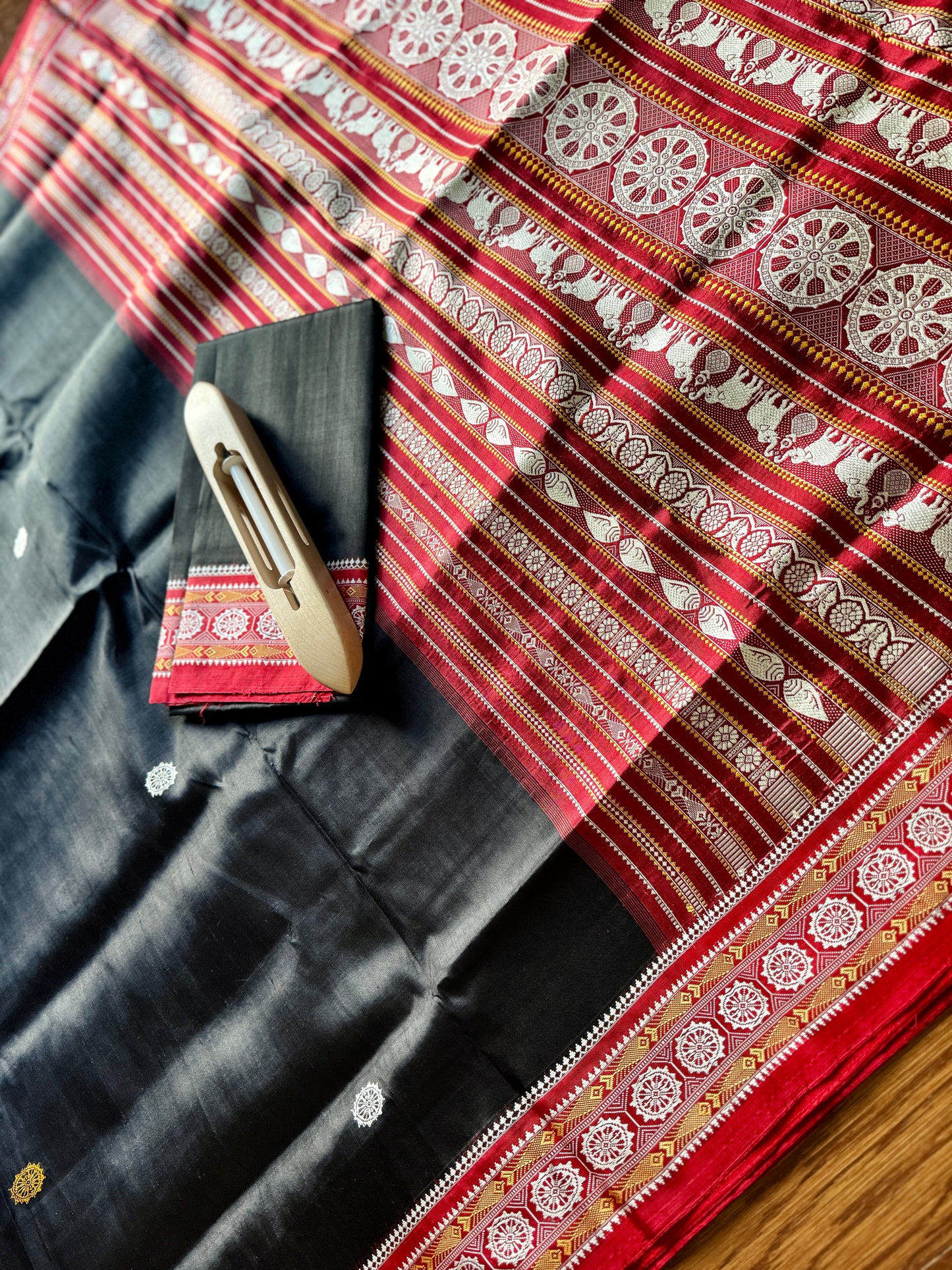 Black with red combinations contemporary ikat from Odisha weaves with konark chakra jala weaving