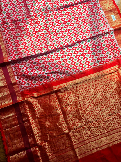 Red Twill Ikkat (Pochampally)handwoven pure silk Saree with Zari Woven Kanchipuram Border