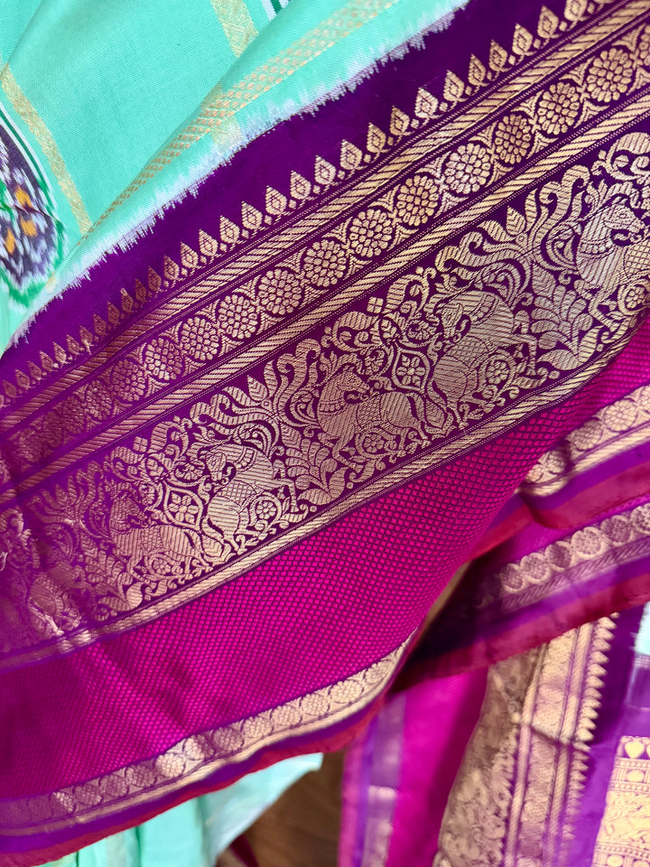 Mint Green Deep Magenta Ikkat (Pochampally)Fusion Silk Saree with Zari Woven Kanchipuram Border and Unstitched Blouse