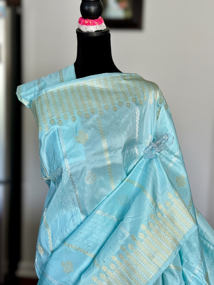 Icy Blue color Banarasi pure katan silk saree with kadhua work along with artistic meenakari bundis