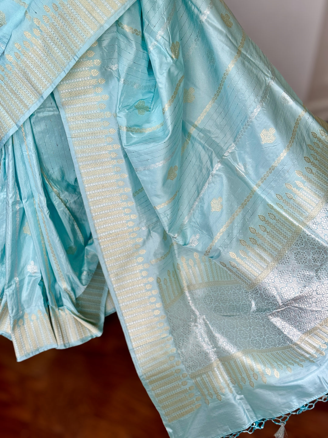 Icy Blue color Banarasi pure katan silk saree with kadhua work along with artistic meenakari bundis