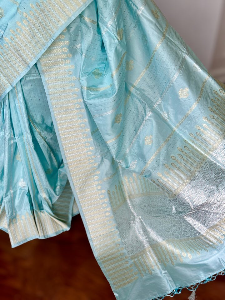 Icy Blue color Banarasi pure katan silk saree with kadhua work along with artistic meenakari bundis