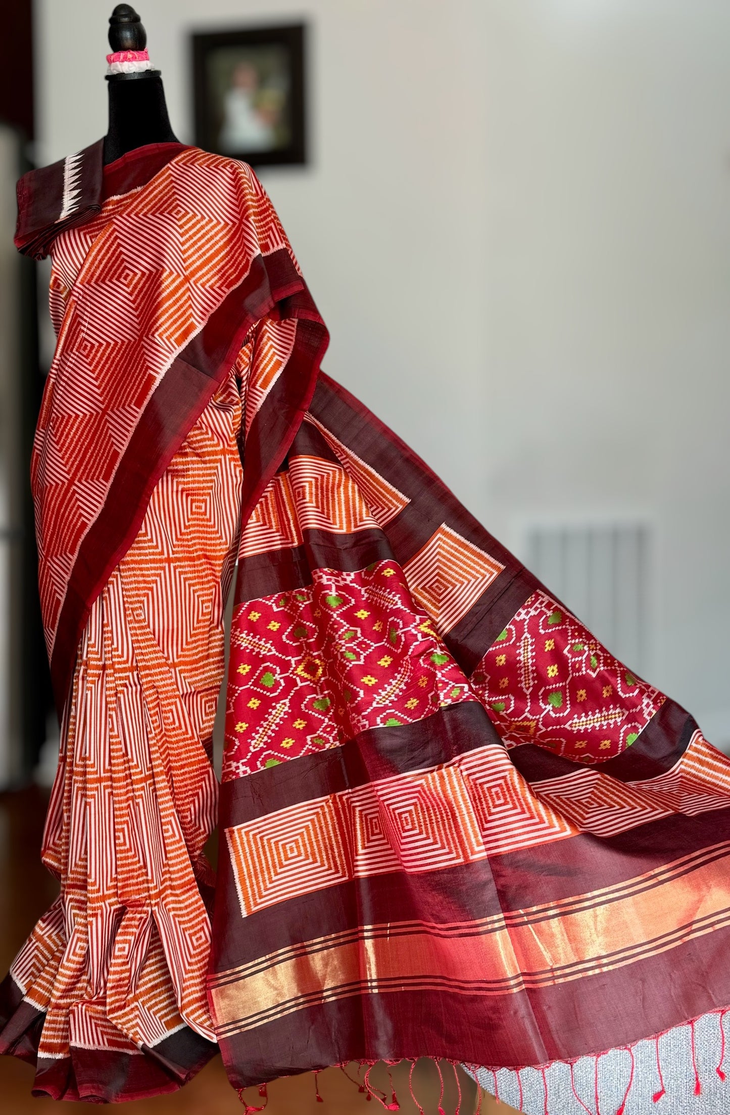 Orange and Brown combination Contemporary ikat pure silk saree with mirror effect body design