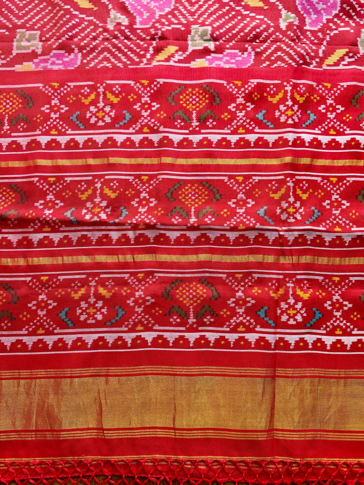 Red color single ikat patan Patola pure silk saree (aka semi-double ikat)