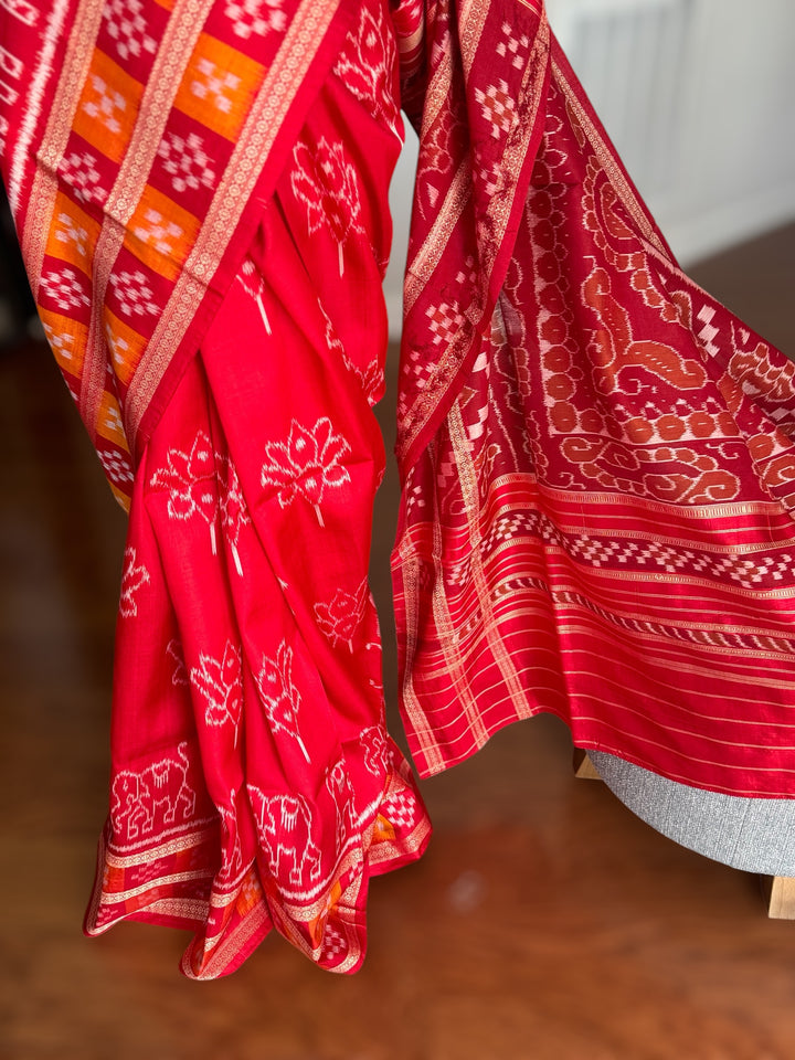 Red color Elegant khandua ikat pure silk saree with Elephant lotus motifs in body and pasapalli border |Odisha Weaves