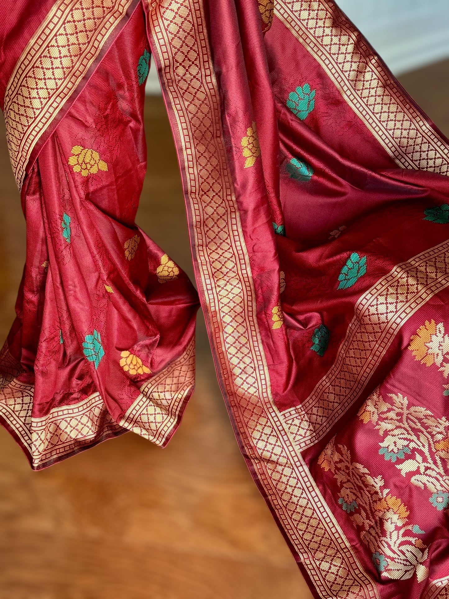 Lovely rust red designer weaved and textured saree with stitched blouse| Value Vogue