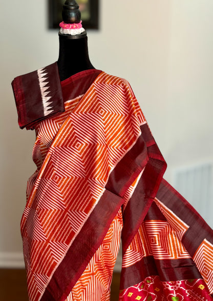 Orange and Brown combination Contemporary ikat pure silk saree with mirror effect body design