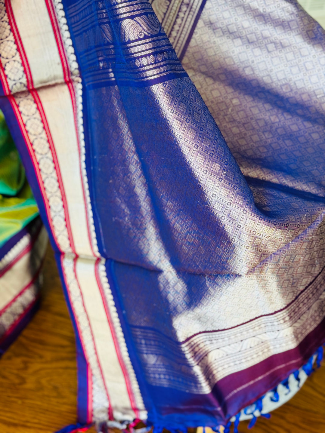 Light Green vintage Checks Gadwal Pure Silk Saree with zari buttas and contrast Indigo border
