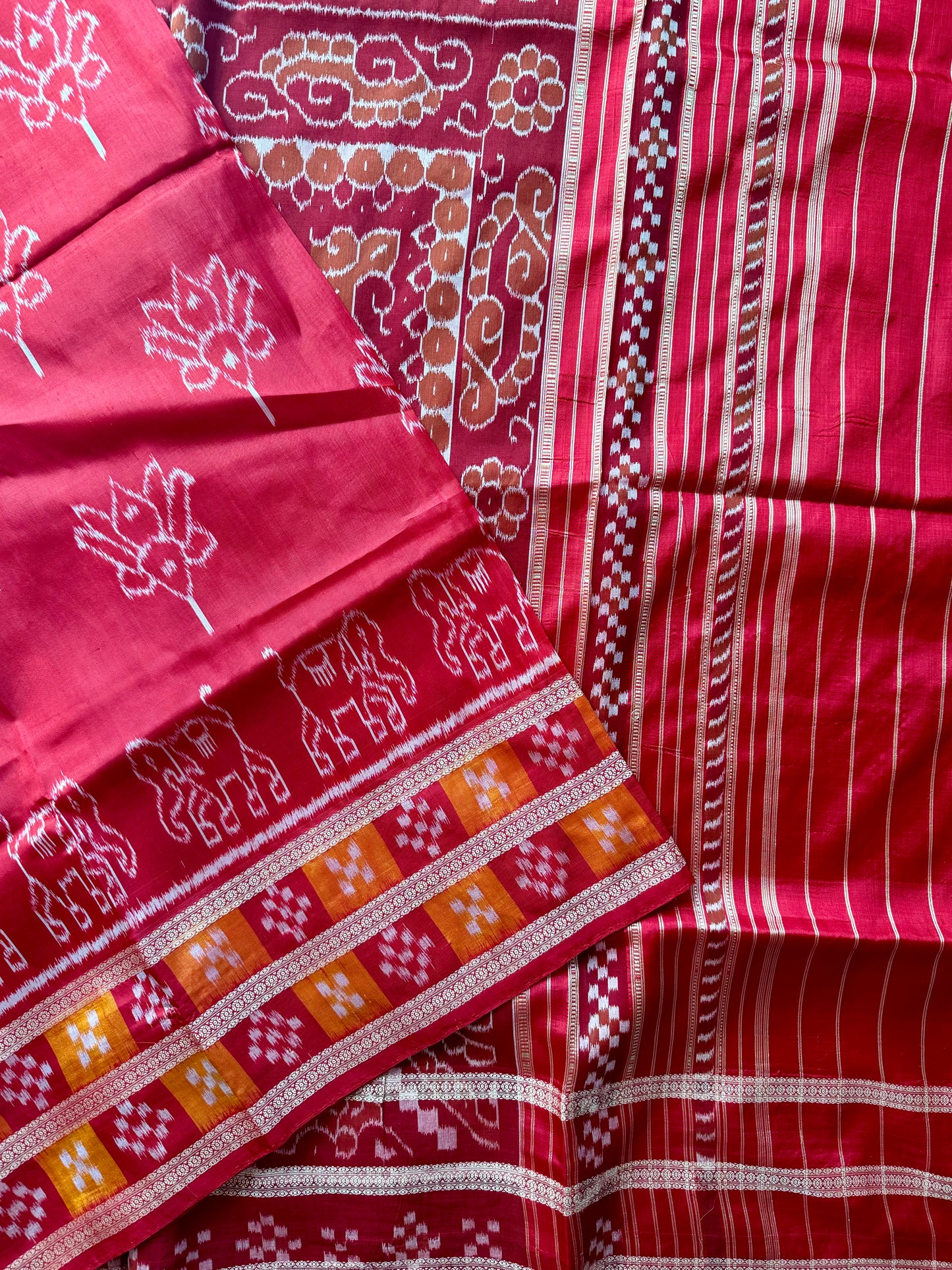 Red color Elegant khandua ikat pure silk saree with Elephant lotus motifs in body and pasapalli border