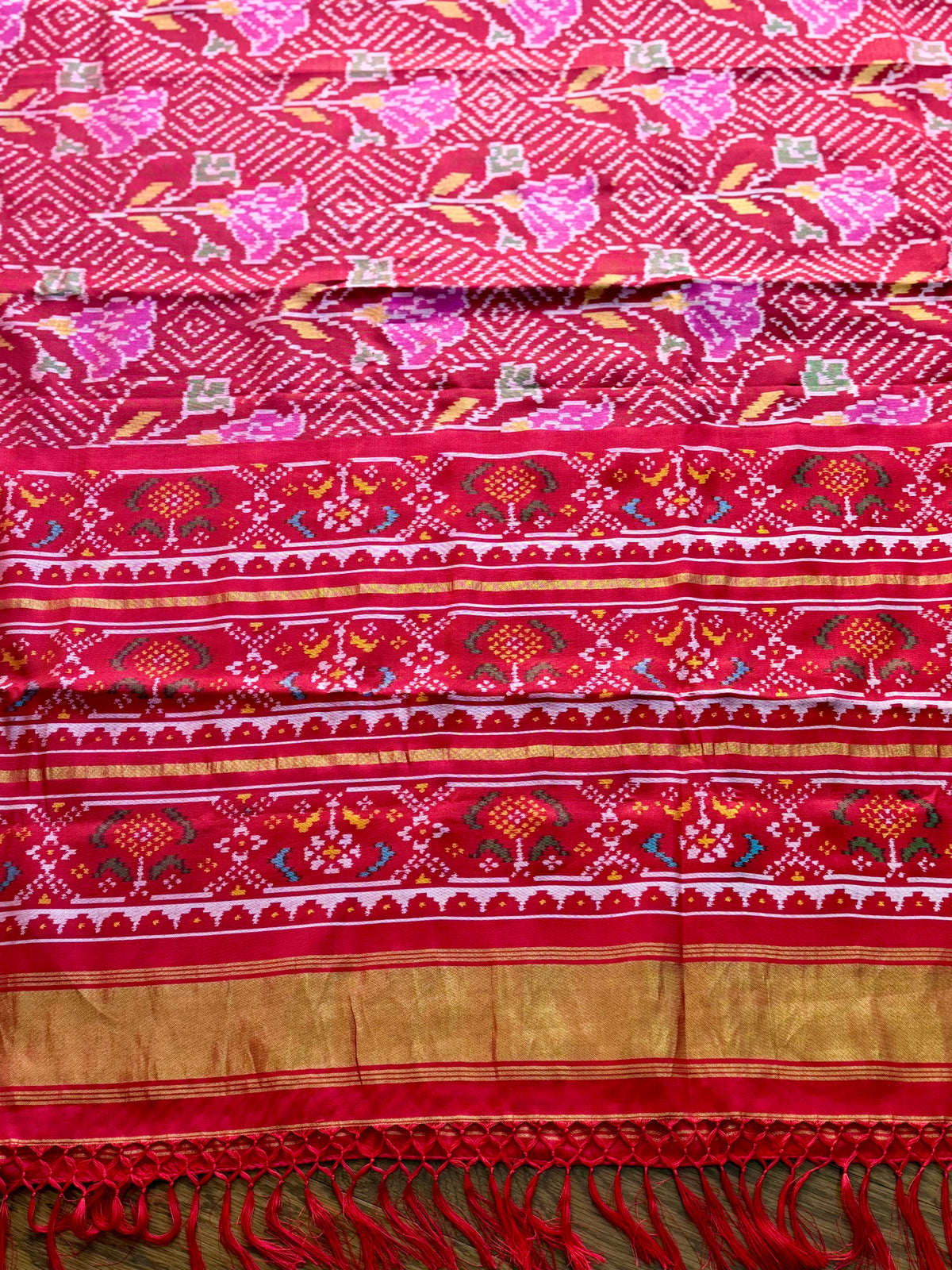 Red color single ikat patan Patola pure silk saree (aka semi-double ikat)