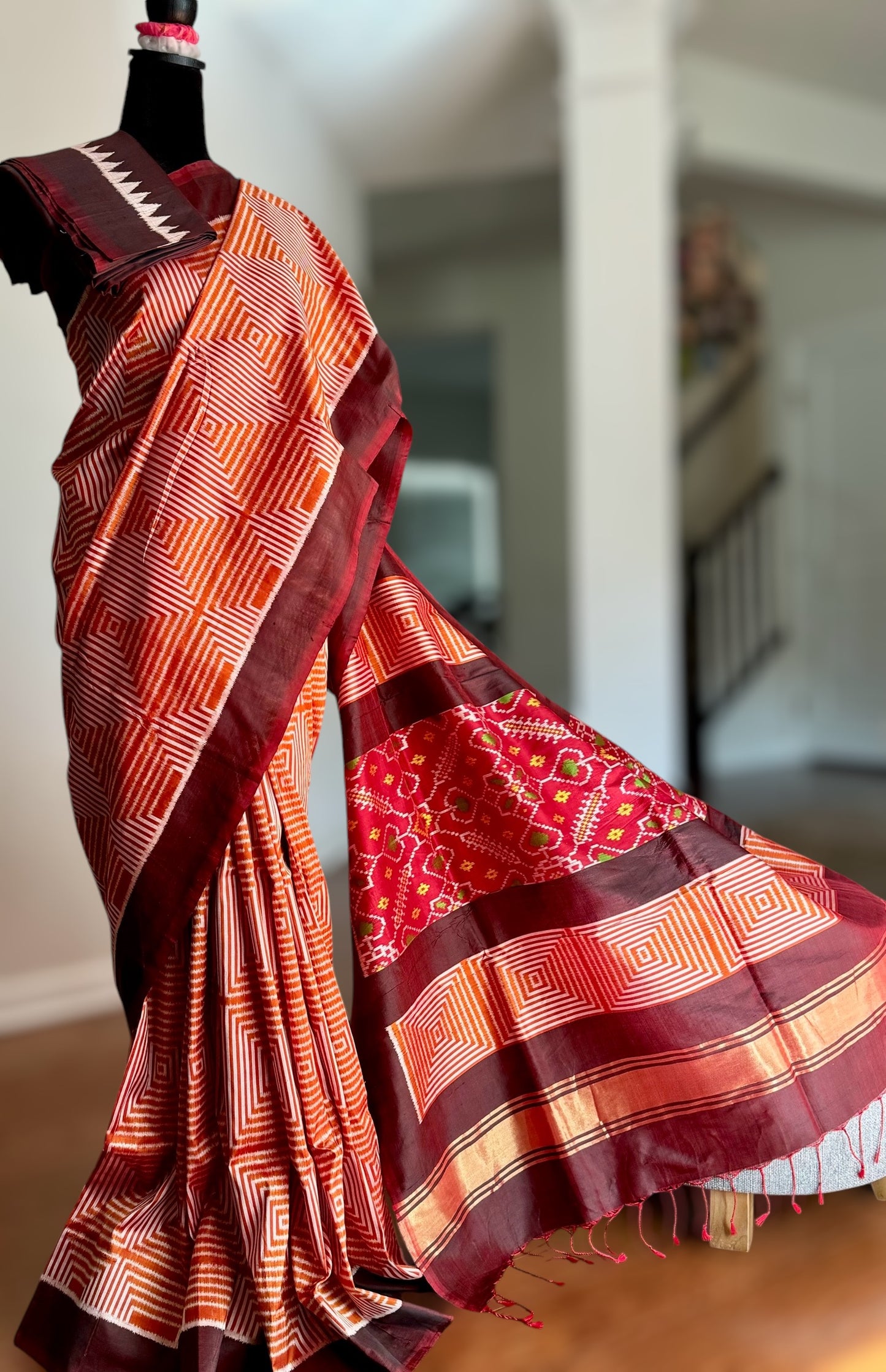 Orange and Brown combination Contemporary ikat pure silk saree with mirror effect body design