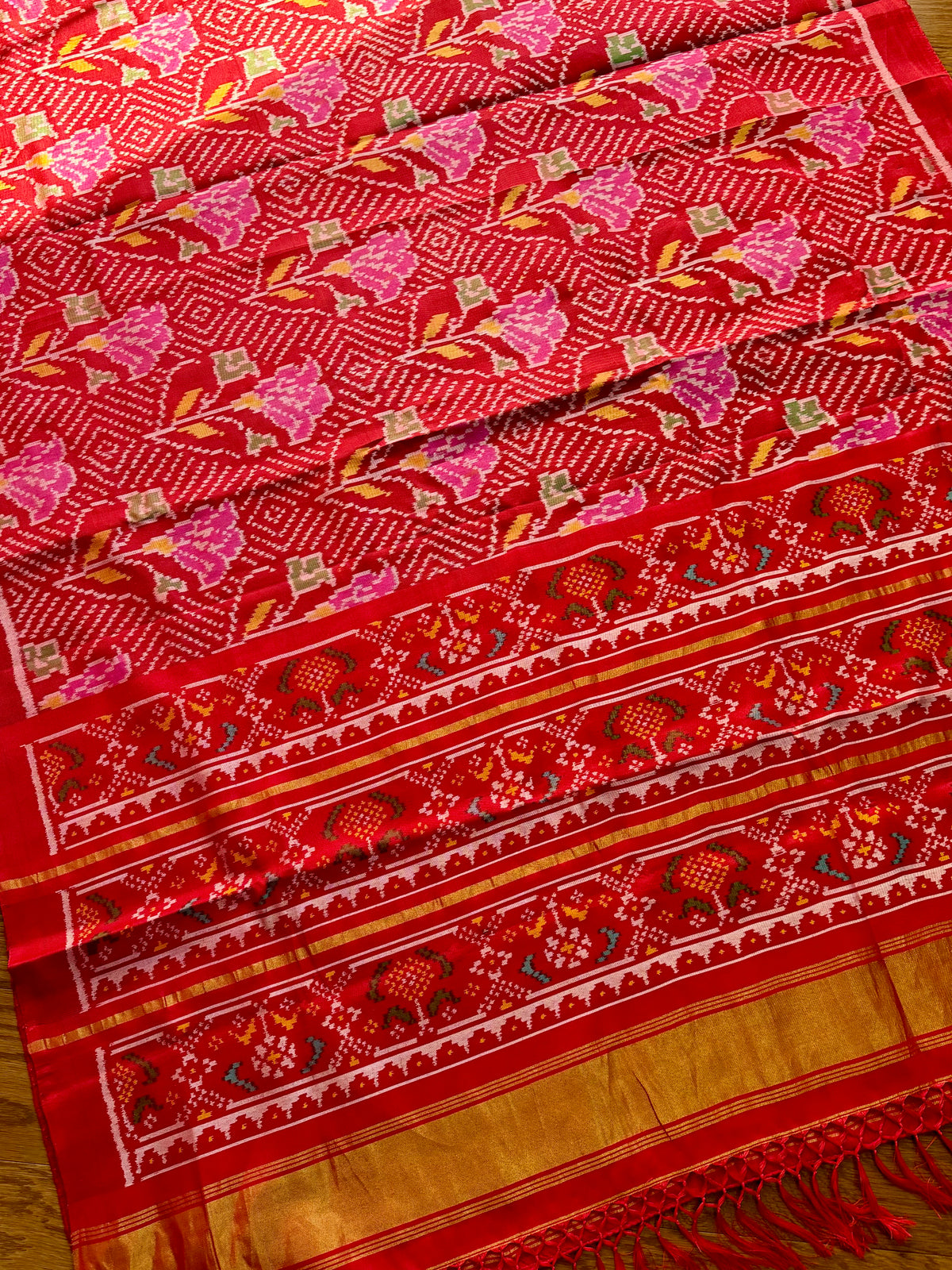 Red color single ikat patan Patola pure silk saree (aka semi-double ikat)