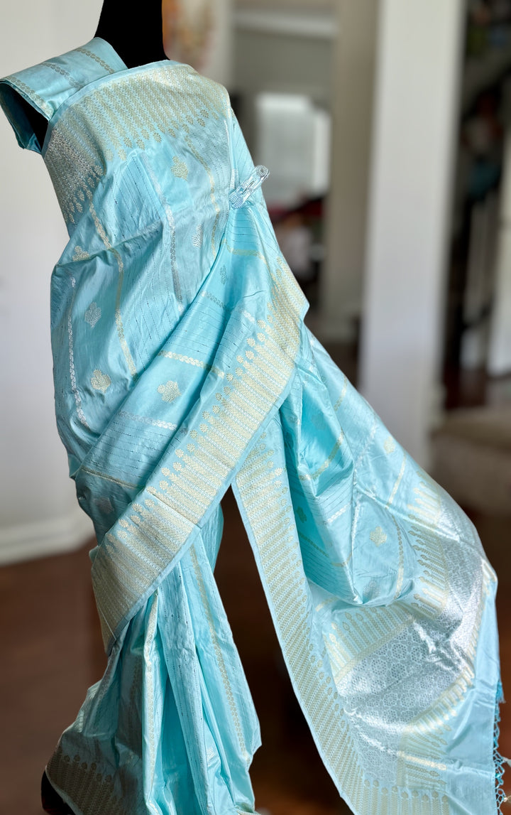 Icy Blue color Banarasi pure katan silk saree with kadhua work along with artistic meenakari bundis