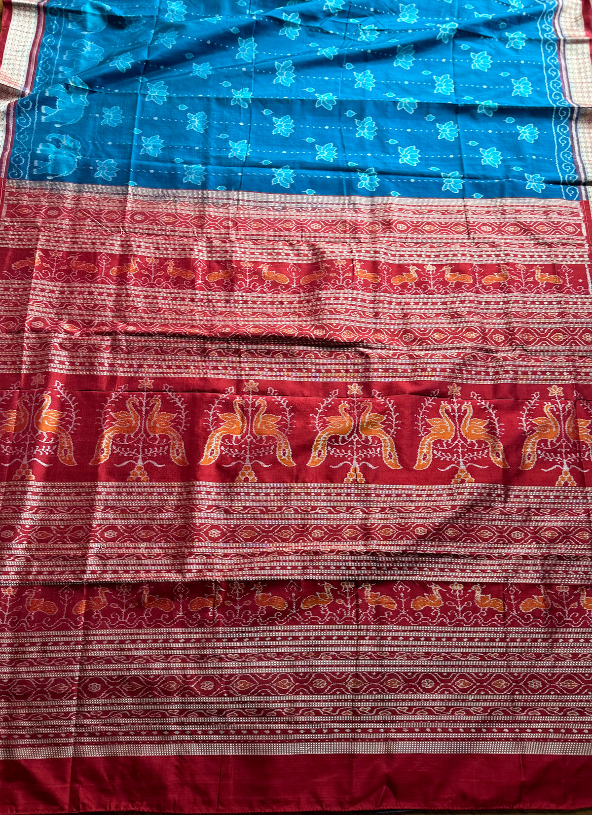 Teal blue and maroon handwoven Sambalpuri thousand motif pure Ikkat silk saree | Odisha Weaves