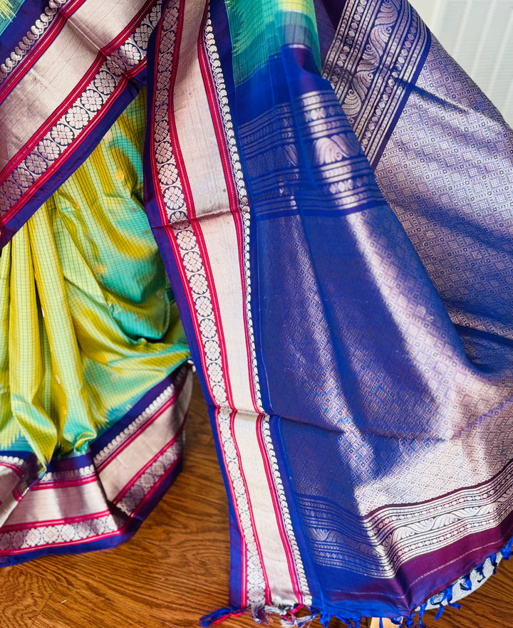 Light Green vintage Checks Gadwal Pure Silk Saree with zari buttas and contrast Indigo border