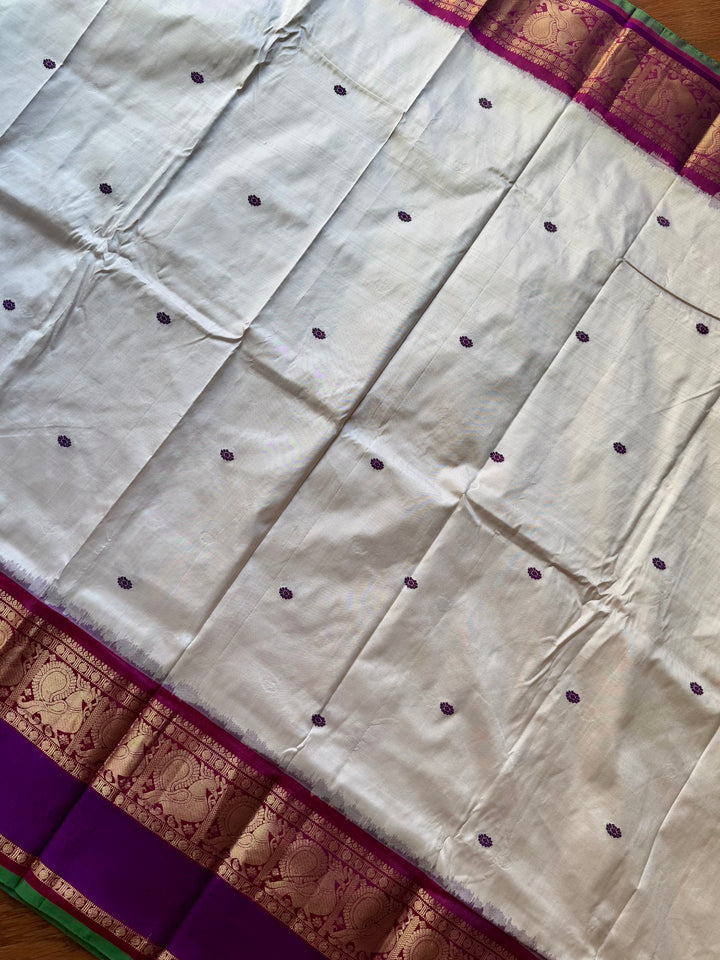 White Purple Ikkat (Pochampally)Silk Saree with Zari Woven Kanchipuram Border and Unstitched Blouse