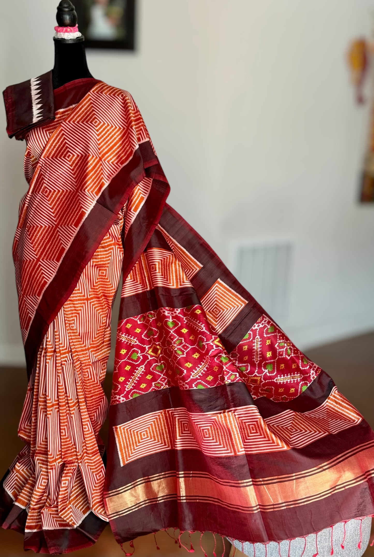 Orange and Brown combination Contemporary ikat pure silk saree with mirror effect body design