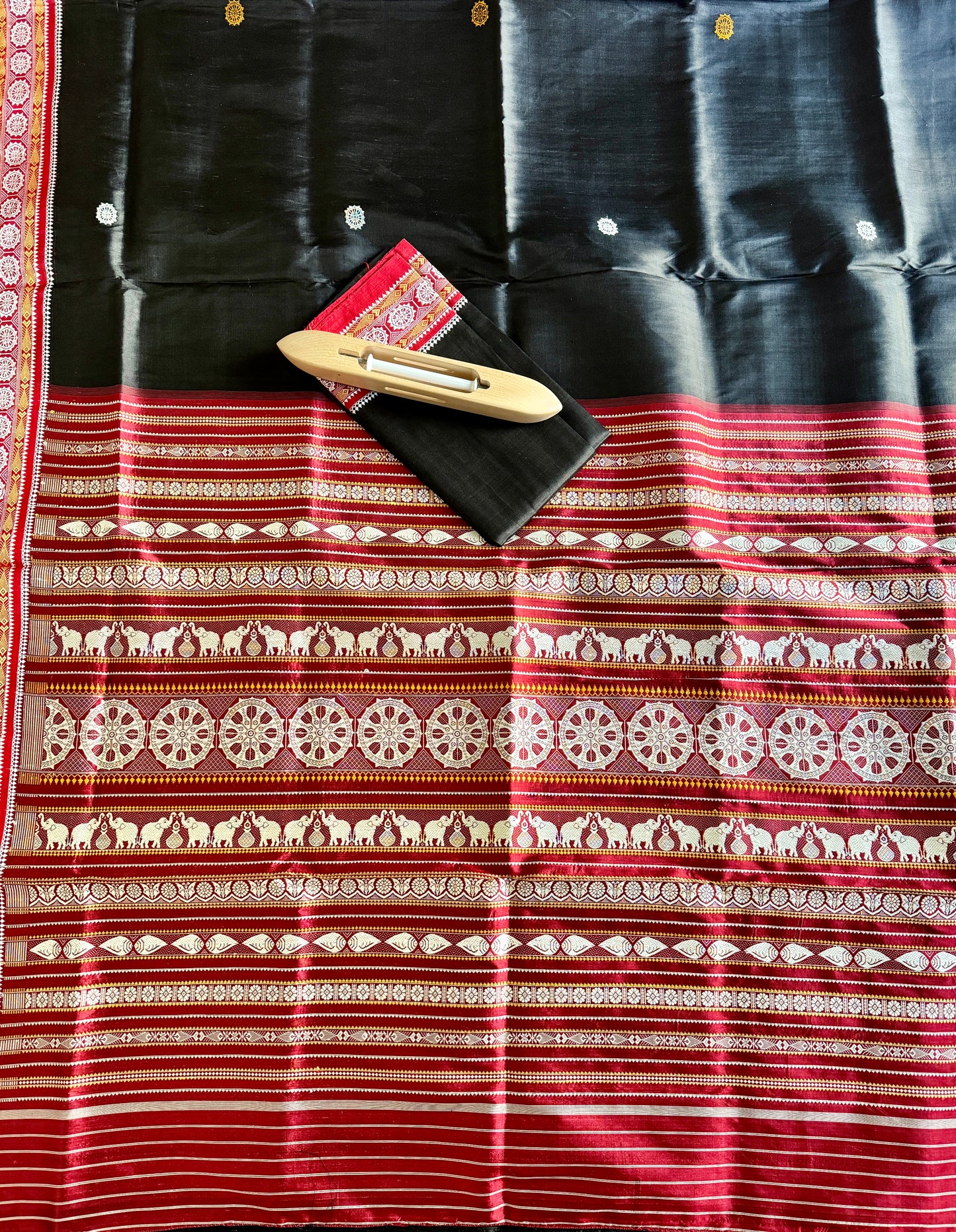 Black with red combinations contemporary ikat from Odisha weaves with konark chakra jala weaving