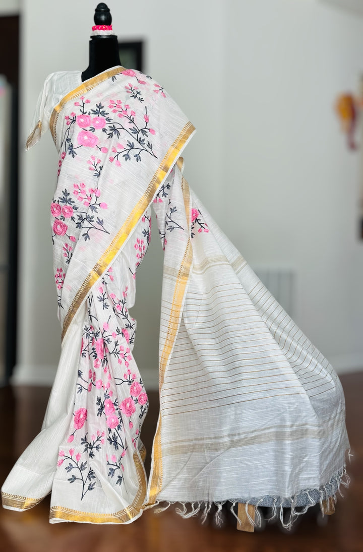White color Linen muslin silk saree with embroidery work and stitched blouse| Value Vogue