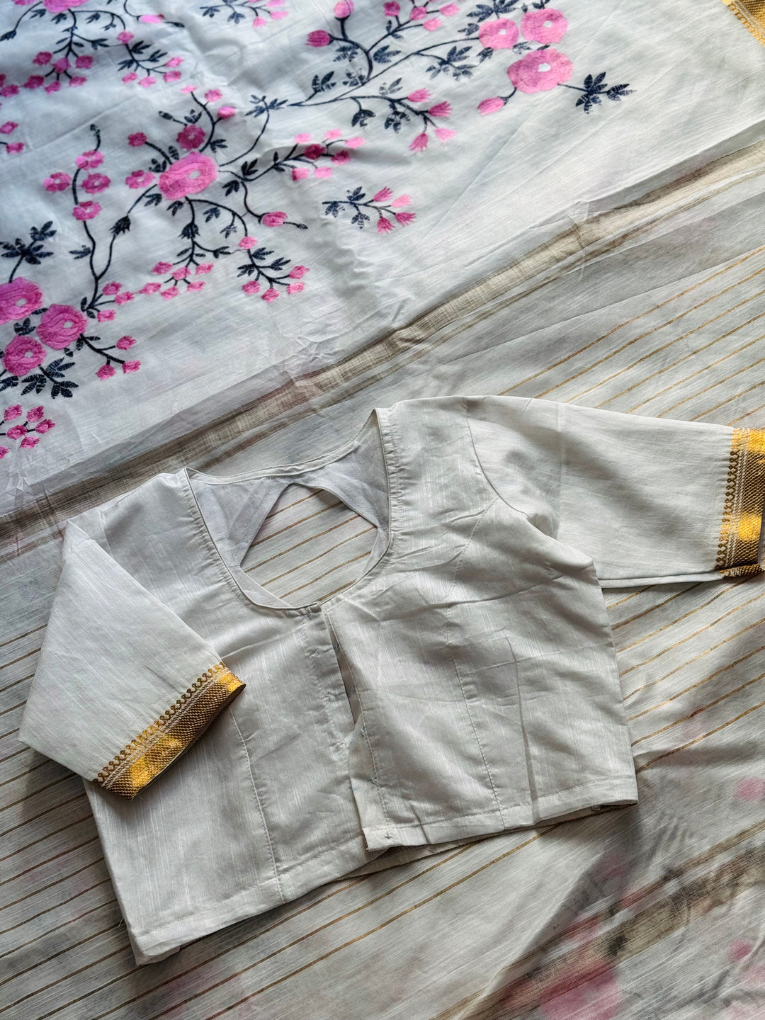 White color Linen muslin silk saree with embroidery work and stitched blouse| Value Vogue