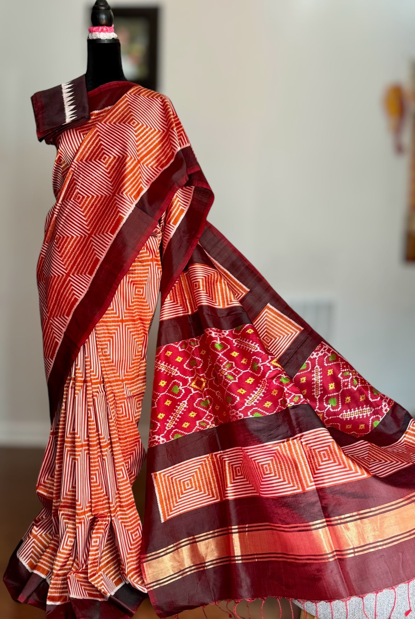 Orange and Brown combination Contemporary ikat pure silk saree with mirror effect body design