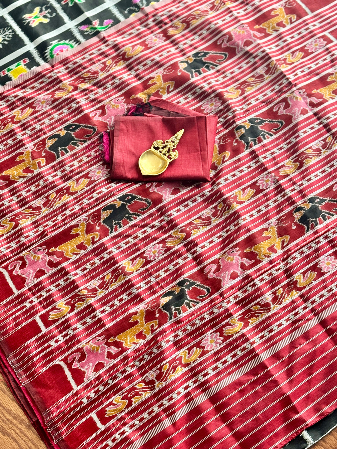 Black with red combinations Contemporary ikkat pure silk saree with Nabakothi theme