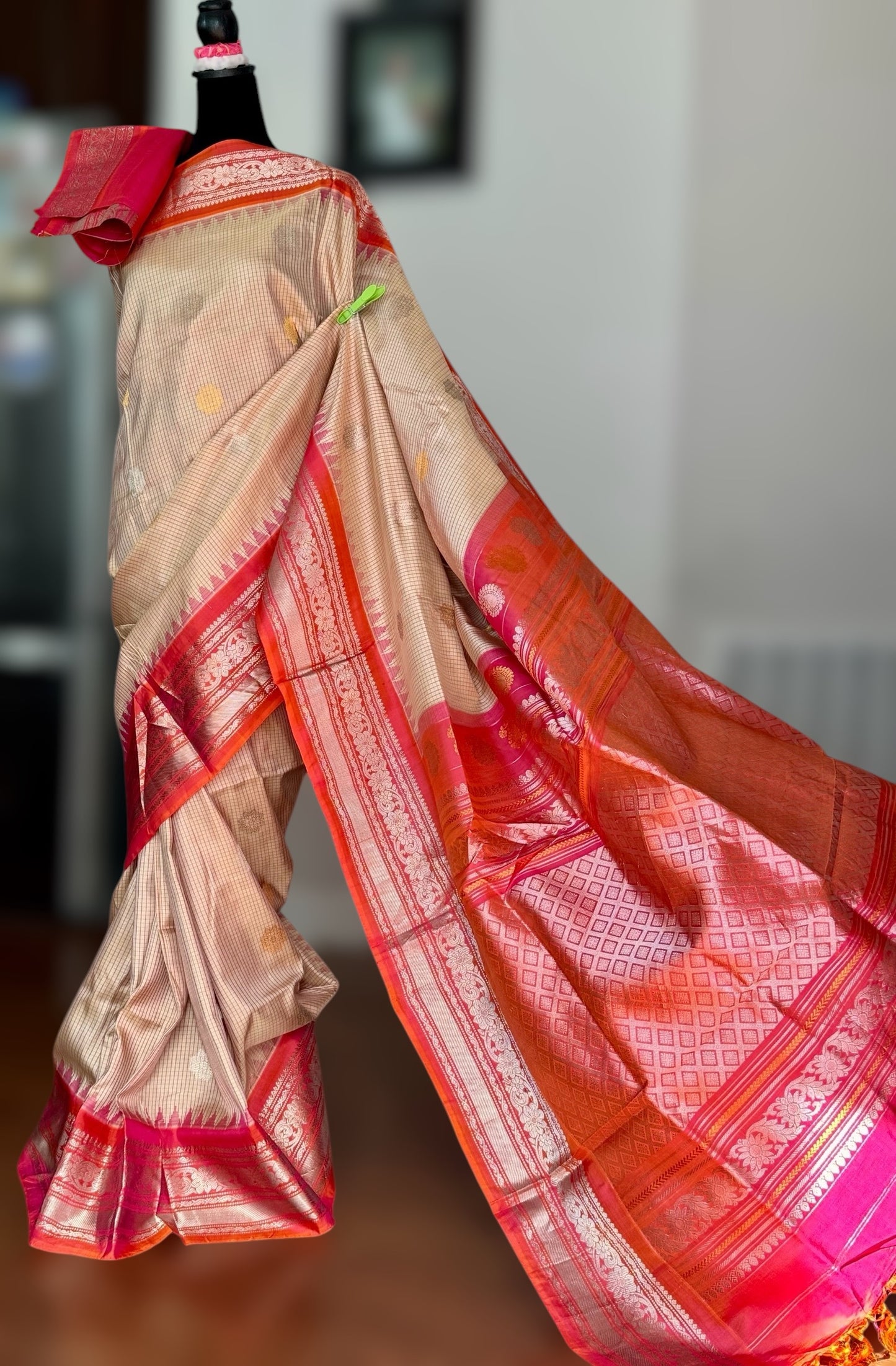 Handwoven Kuttu Gadwal pure Silk Saree in Beige color with orangish peach Checks body