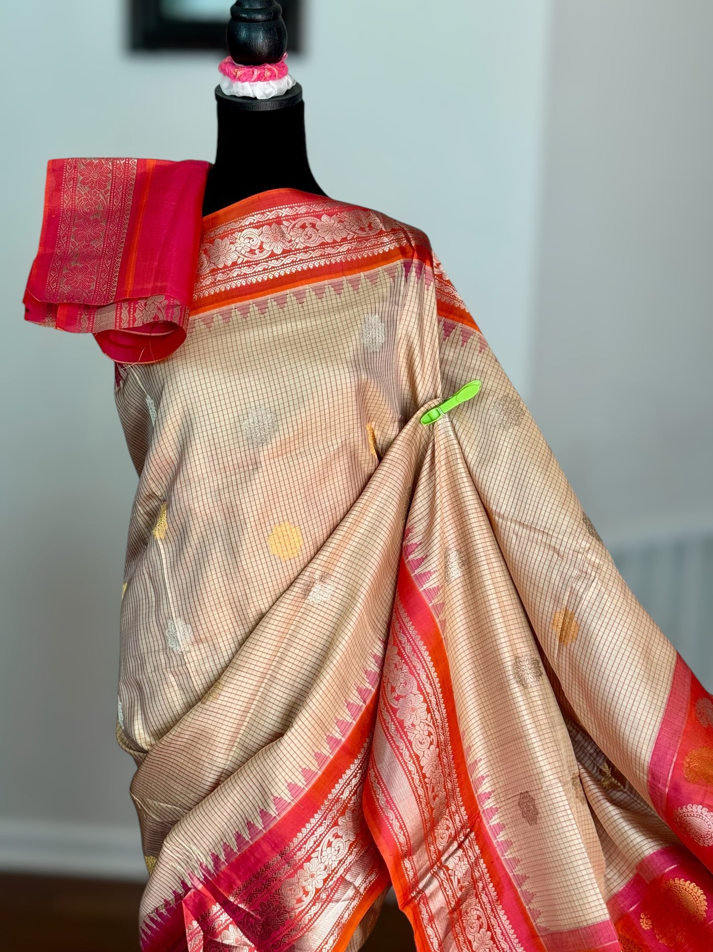 Handwoven Kuttu Gadwal pure Silk Saree in Beige color with orangish peach Checks body