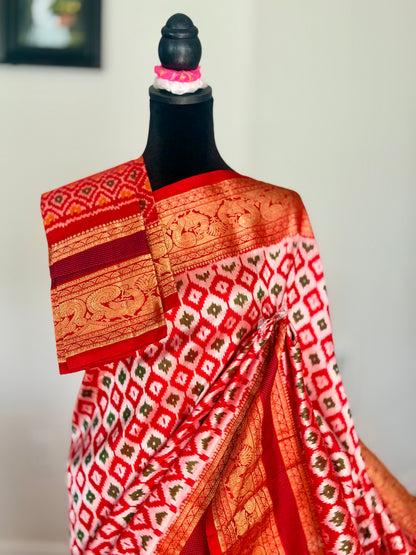 Red Twill Ikkat (Pochampally)handwoven pure silk Saree with Zari Woven Kanchipuram Border